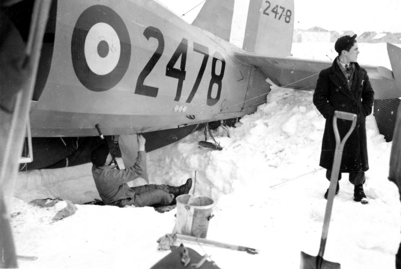 Photo: Bill Baker repairing belly of Norseman 2478